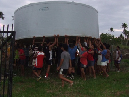 Hihifo rugby club carrying the 45000 litre water tanks lr2