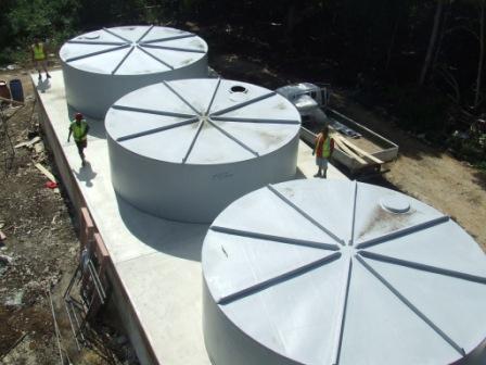 Installing new water tanks in Tonga. Photo - Tonga PACC project - lowres